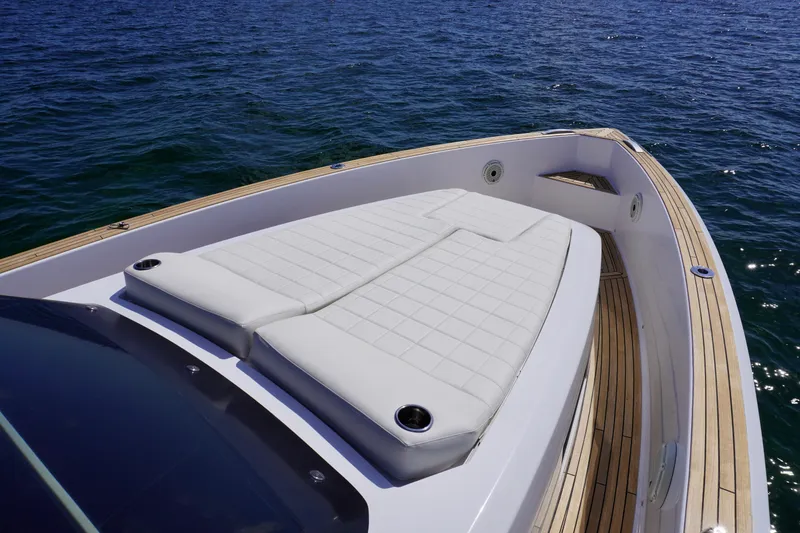 Slide: The Image of Pardo Yachts 38 (2020) with sleek deck design on calm blue water. - 9