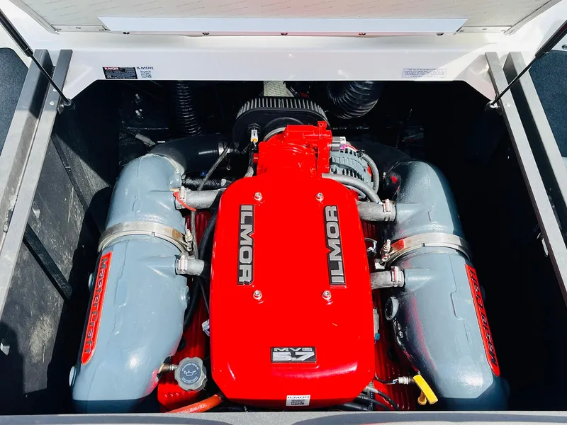 Slide: The Image of 2016 MasterCraft X30 engine with red Ilmor cover, showcasing powerful marine performance. - 47