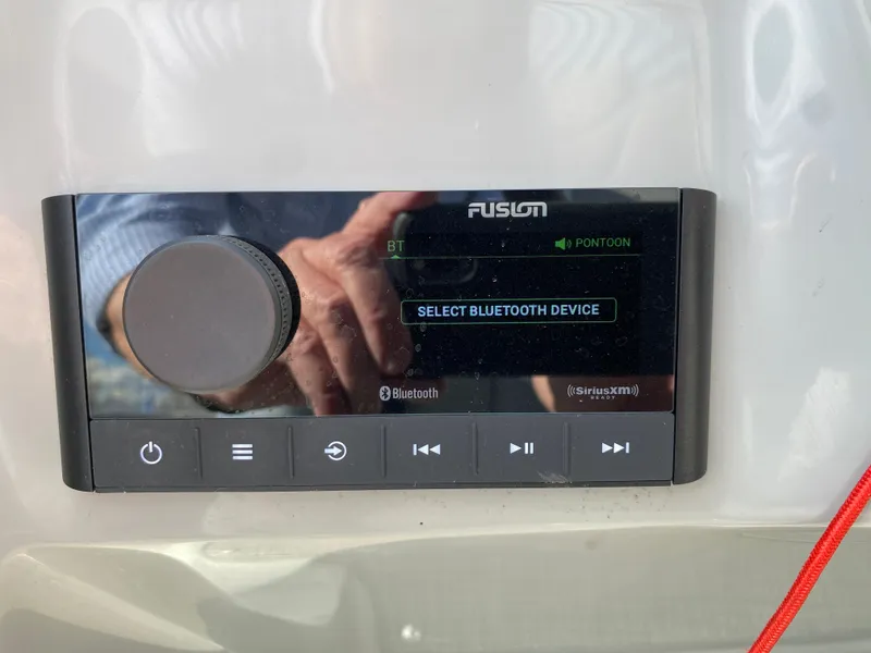 Slide: The Image of Fusion stereo system on 2021 Manitou 25 Encore RF SHP Twin, displaying Bluetooth selection. - 34