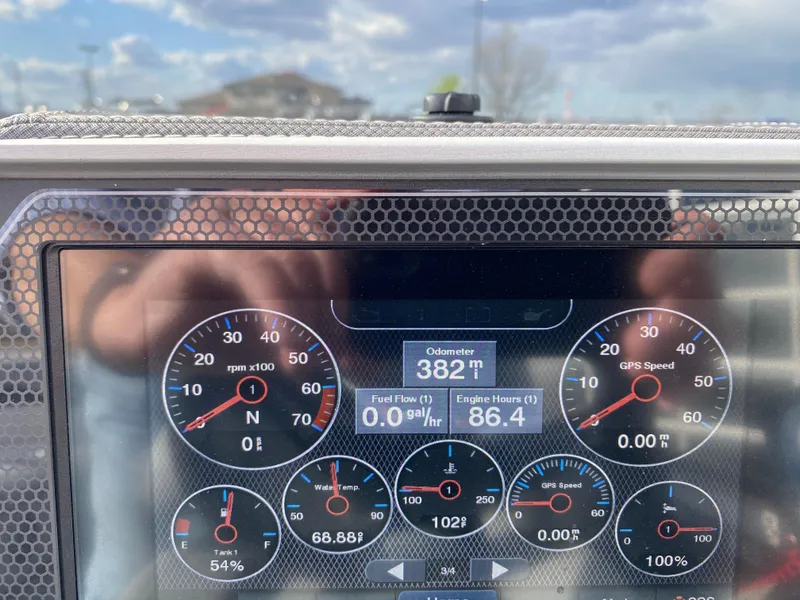 Slide: The Image of Dashboard of 2021 Manitou 25 Encore RF SHP Twin showing gauges and digital readouts. - 35
