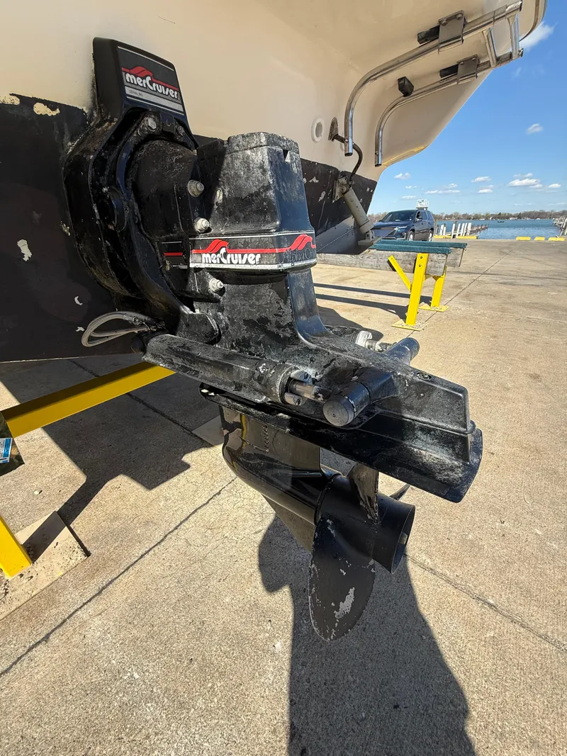 Slide: The Image of 1997 Bayliner 2655 Ciera Sunbridge boat with MerCruiser outdrive, docked on a sunny day. - 9