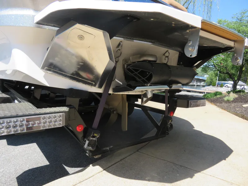 Slide: The Image of 2023 MasterCraft X26 boat trailer with detailed undercarriage view. - 10