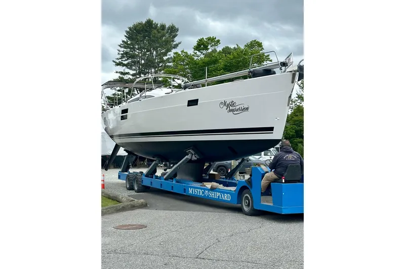 Slide: The Image of 2022 Elan Impression 50.1 yacht on transport at Mystic Shipyard. - 113