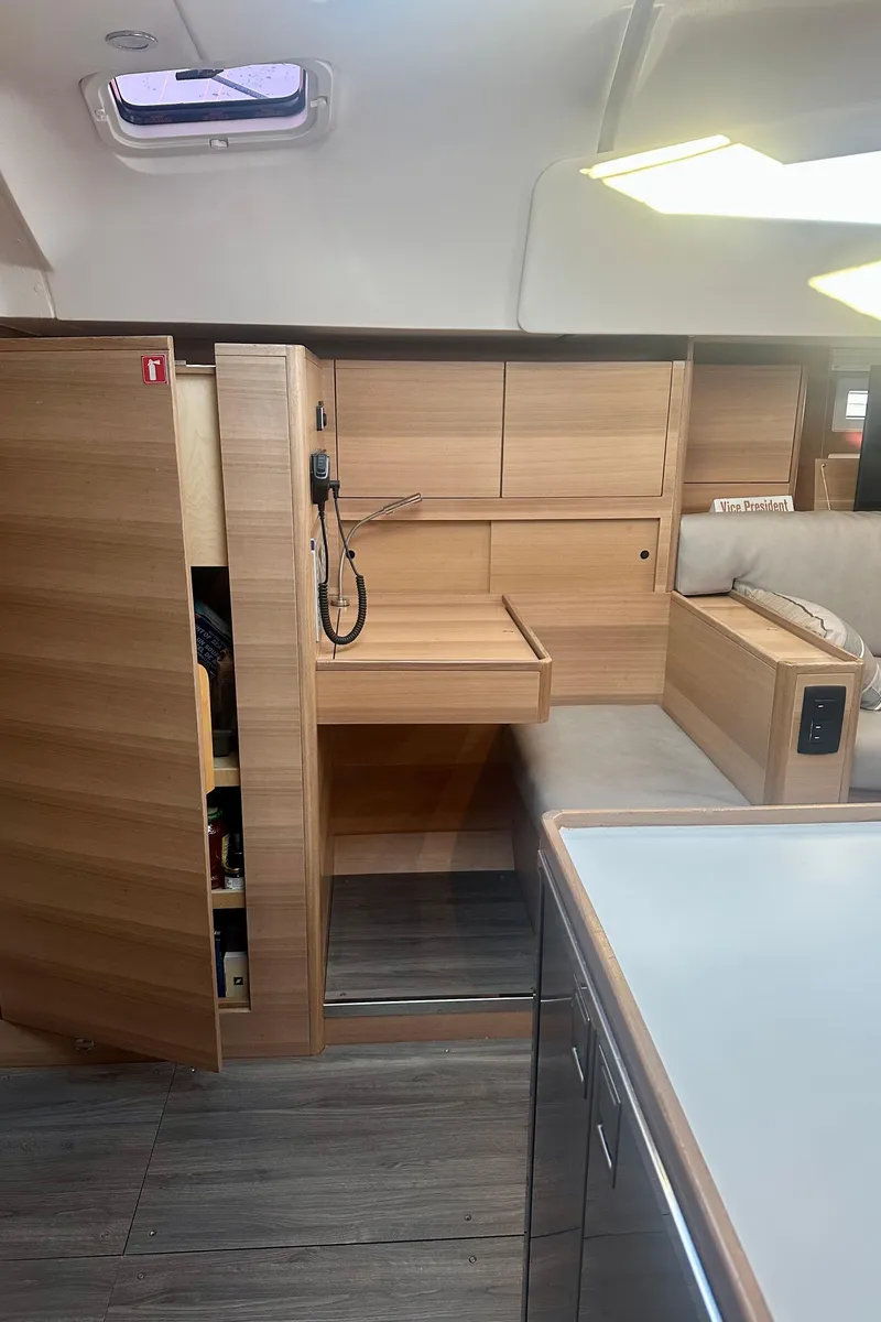 Slide: The Image of Modern interior of 2022 Elan Impression 50.1 yacht with sleek wooden cabinetry. - 35