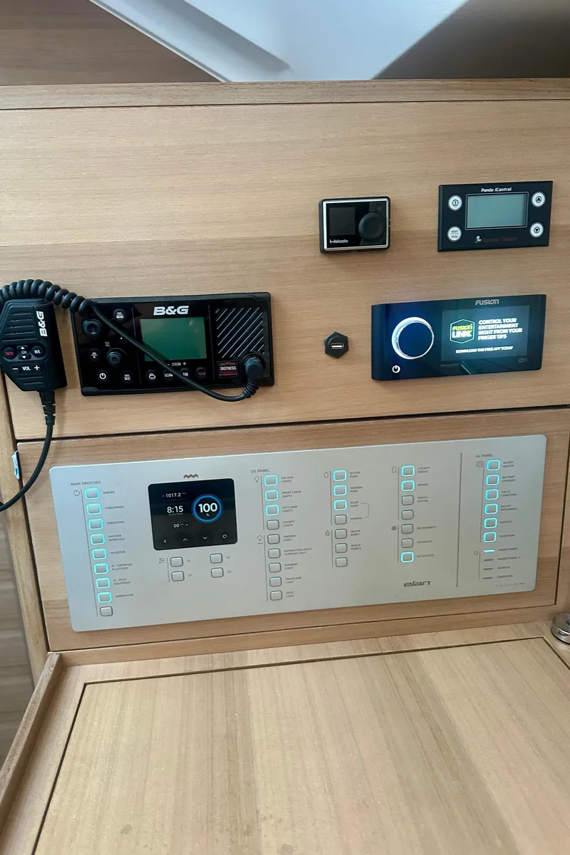 Slide: The Image of Control panel of 2022 Elan Impression 50.1 yacht with navigation and communication systems. - 37