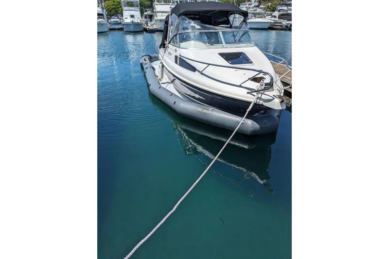 Slide: The Image of Center Console Eco dry dock boat, 2025 model, moored in a marina. - 11