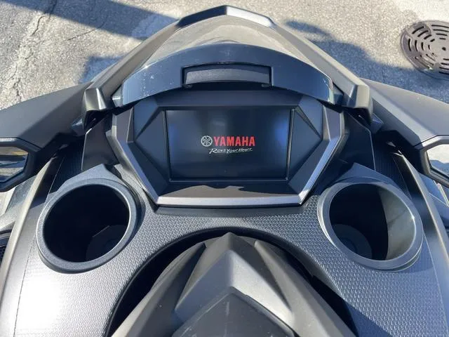 Slide: The Image of 2024 Yamaha Waverunner FX SVHO dashboard with cup holders and display screen. - 20