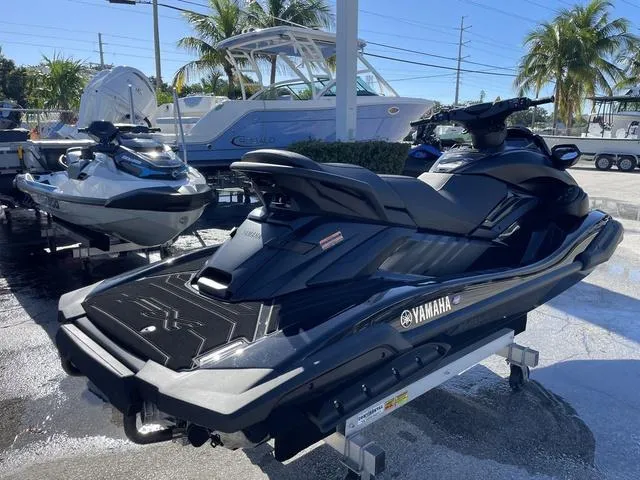 Slide: The Image of 2024 Yamaha Waverunner FX SVHO® jet ski displayed outdoors on a sunny day. - 6