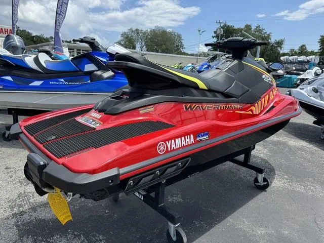 Slide: The Image of 2024 Yamaha WaveRunner EX in red, displayed outdoors on a stand. - 6