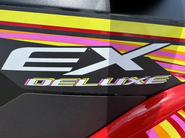 Slide: The Image of 2024 Yamaha WaveRunner EX Deluxe with vibrant graphics and bold lettering. - 9