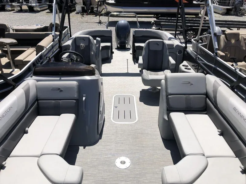 Slide: The Image of 2022 Bennington 22 SSRX pontoon boat interior with spacious seating and modern design. - 3