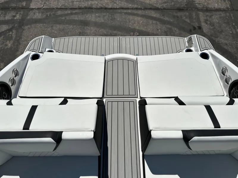 Slide: The Image of 2025 Yamaha Boats 222SD deck with sleek seating and modern design. - 17