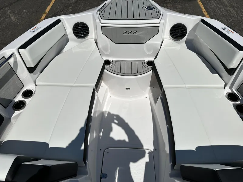 Slide: The Image of 2025 Yamaha Boats 222SD interior with white seating and modern design. - 7