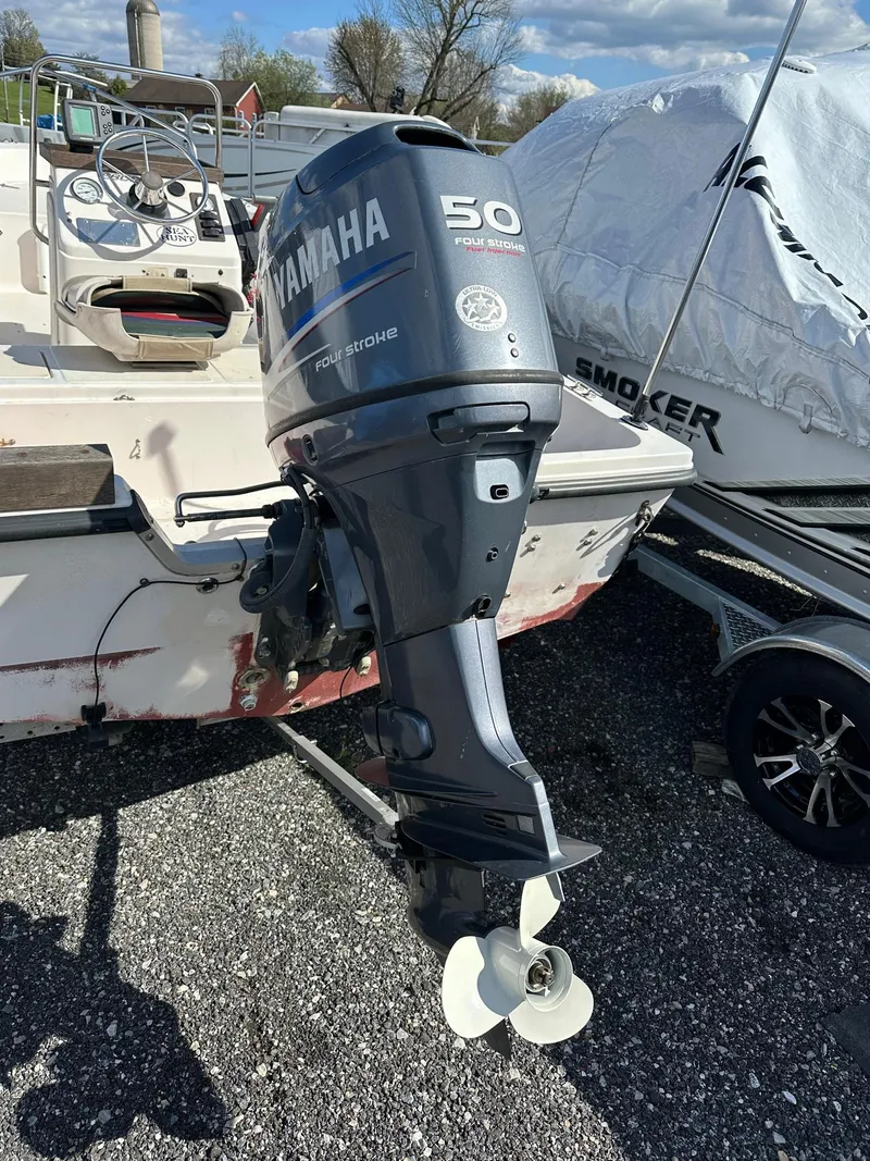 Slide: The Image of Sea Hunt 15' fiberglass boat with Yamaha 50Hp 4-stroke engine and trailer, 1996 model. - 7