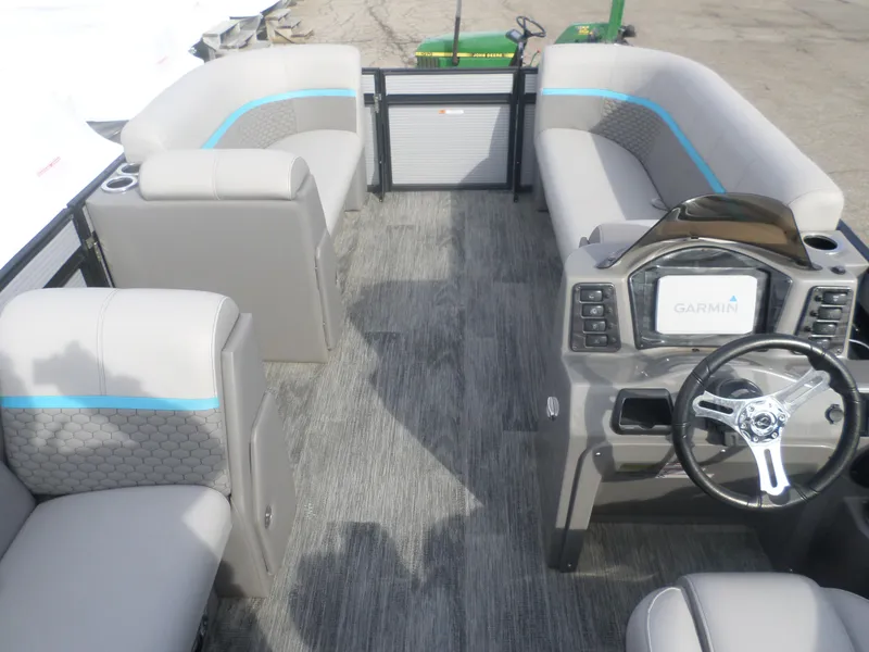 Slide: The Image of 2022 Apex Qwest 818 Lanai LTZ TRI pontoon boat interior with Garmin navigation system. - 5