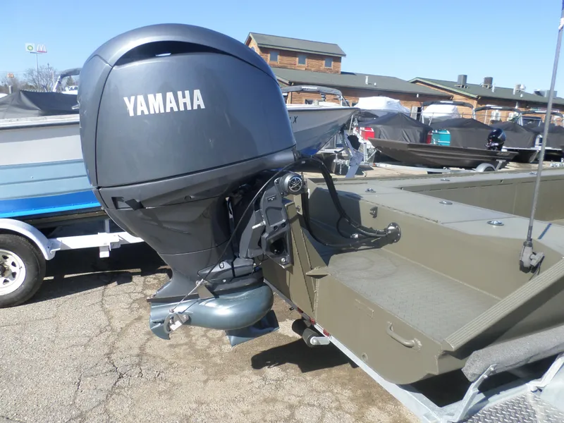 Slide: The Image of 2022 Gator Trax 1862 BIG Water boat with Yamaha outboard motor, parked outdoors. - 8