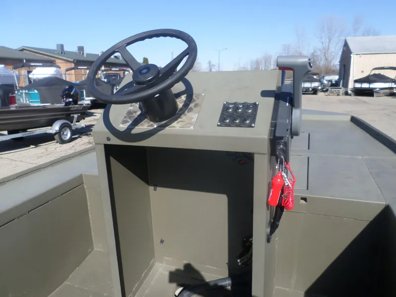 Slide: The Image of 2022 Gator Trax 1862 BIG Water boat console with steering wheel and controls. - 9