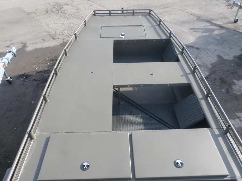 Slide: The Image of 2024 Gator Trax 1862 4 Man Hide boat, top view, showcasing storage compartments. - 7