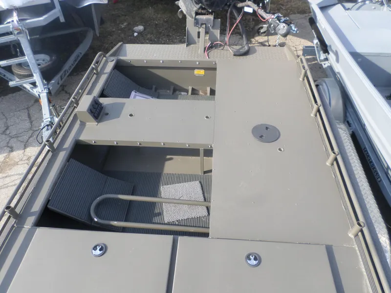 Slide: The Image of 2024 Gator Trax 1862 4 Man Hide boat interior with seating and storage compartments. - 9