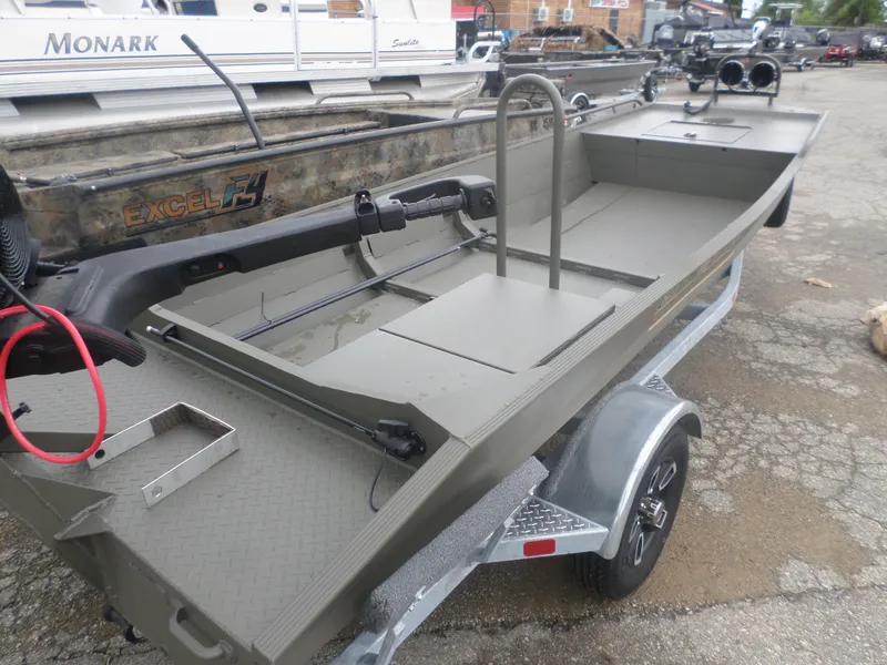 Slide: The Image of 2024 Gator Trax 1544 boat on trailer, featuring a spacious, open deck design. - 3