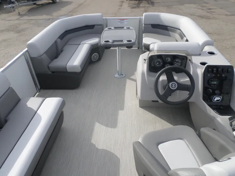 Slide: The Image of 2025 Princecraft Vectra 19 L pontoon boat interior with seating and steering console. - 5