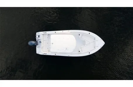 Slide: The Image of Aerial view of 2022 Sea Hunt Ultra 229 boat on dark water. - 17