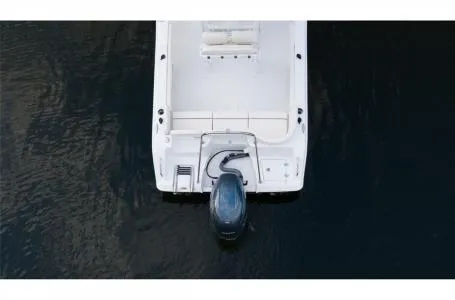 Slide: The Image of 2022 Sea Hunt Ultra 229 boat, aerial view, on dark water. - 5