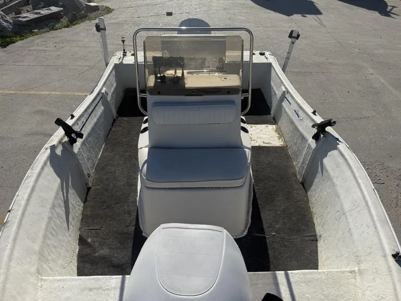 Slide: The Image of 1997 Polar 17 CC boat interior with seating and console, viewed from above. - 11