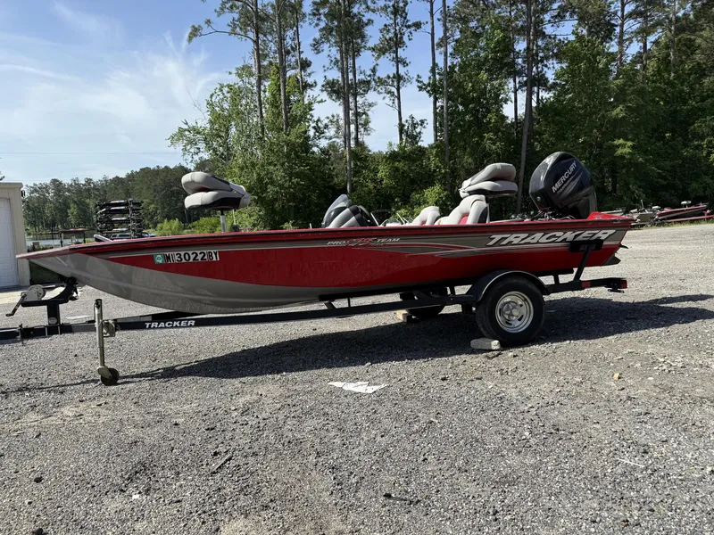 Slide: The Image of 2017 Tracker Pro Team 175 TXW boat on trailer, parked outdoors. - 6