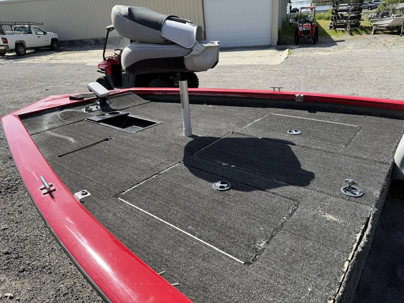 Slide: The Image of 2017 Tracker Pro Team 175 TXW boat deck with storage compartments and seat. - 8