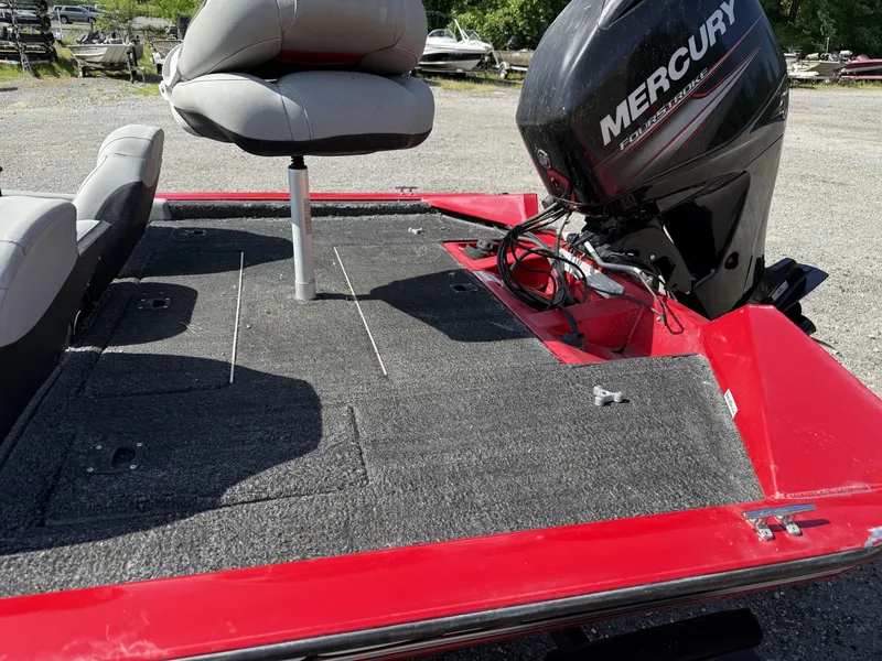 Slide: The Image of 2017 Tracker Pro Team 175 TXW boat with Mercury engine, red and gray interior. - 9