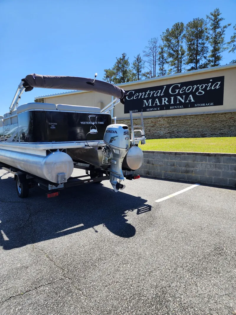 Slide: The Image of Sweetwater SW 2086 pontoon boat at Central Georgia Marina, 2012 model, with Honda outboard motor. - 2