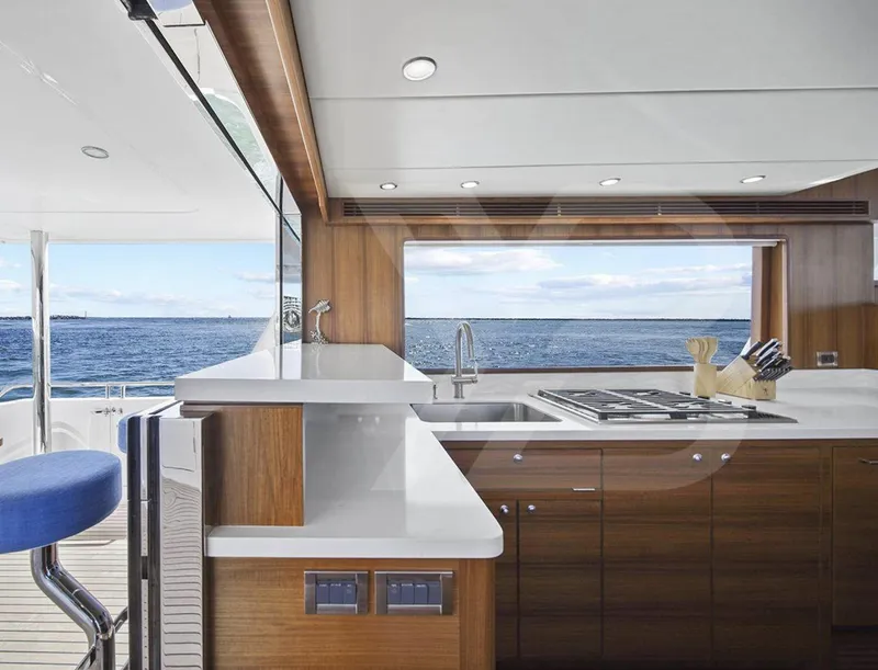 Slide: The Image of Luxurious kitchen interior of 2023 Outer Reef Yachts 720 Azure Motoryacht with ocean view. - 10
