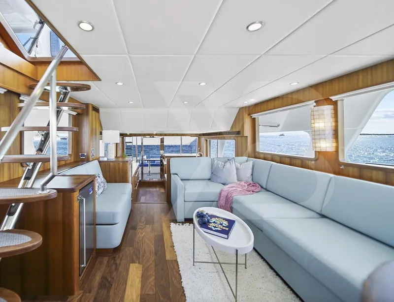 Slide: The Image of Luxurious interior of 2023 Outer Reef Yachts 720 Azure Custom Cockpit Motoryacht, featuring elegant seating. - 16