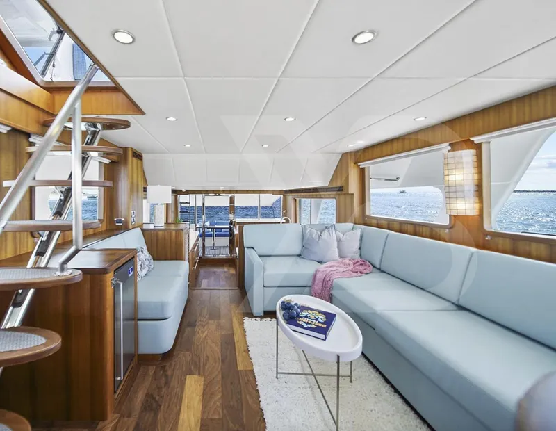 Slide: The Image of Luxurious interior of 2023 Outer Reef Yachts 720 Azure Motoryacht with elegant seating and ocean view. - 21