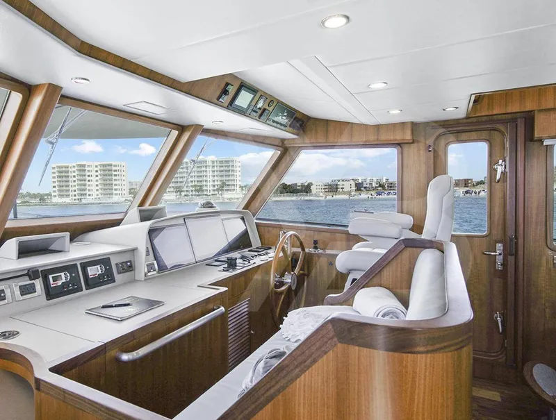 Slide: The Image of Luxurious interior of 2023 Outer Reef Yachts 720 Azure Custom Cockpit Motoryacht with panoramic windows. - 24