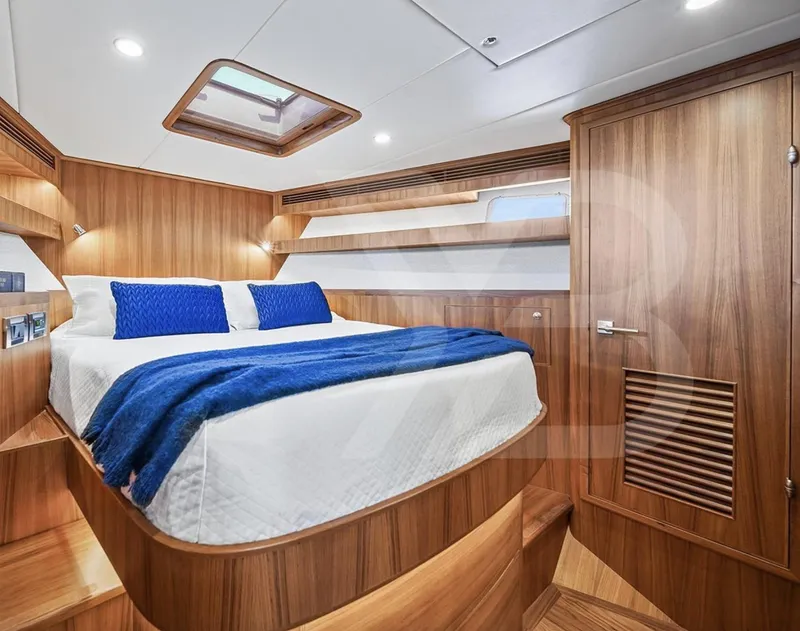 Slide: The Image of Luxurious cabin interior of 2023 Outer Reef Yachts 720 Azure Motoryacht with wood finish. - 30