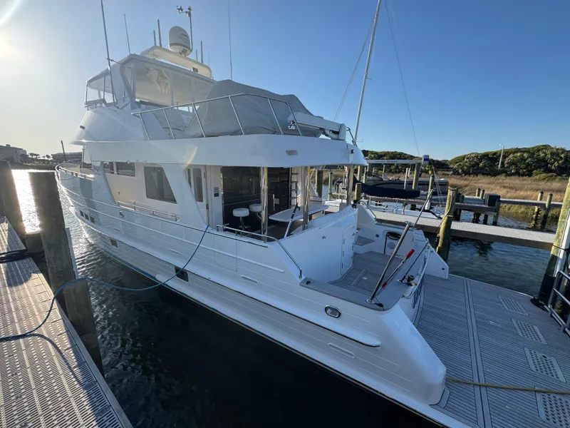 Slide: The Image of 2023 Outer Reef Yachts 720 Azure Custom Cockpit Motoryacht docked at marina. - 4