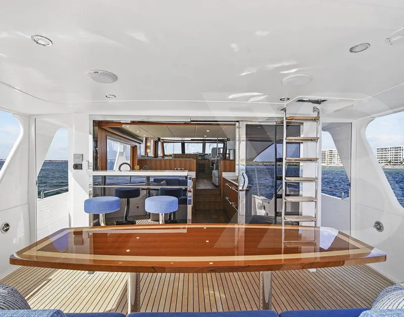 Slide: The Image of 2023 Outer Reef Yachts 720 Azure Custom Cockpit Motoryacht interior with elegant seating and ocean view. - 8
