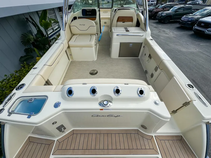 Slide: The Image of 2025 Chris-Craft Calypso 28 boat interior with seating and storage compartments. - 11