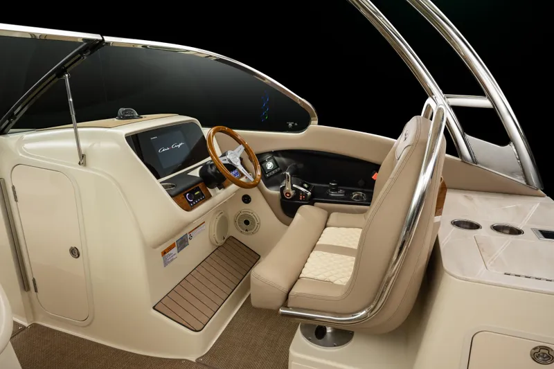 Slide: The Image of 2025 Chris-Craft Calypso 28 boat interior with elegant helm and seating. - 42