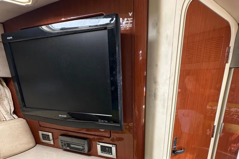 Slide: The Image of Interior of 2011 Formula 350 Sun Sport with TV and entertainment system. - 23