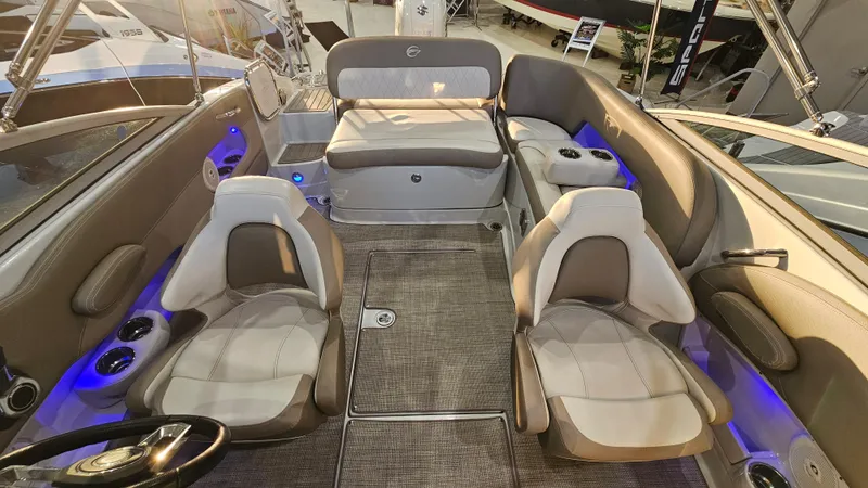 Slide: The Image of 2020 Crownline Eclipse E215 XS boat interior with plush seating and modern design. - 10