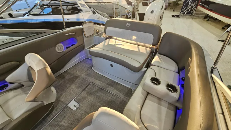 Slide: The Image of 2020 Crownline Eclipse E215 XS boat interior with plush seating and cup holders. - 12