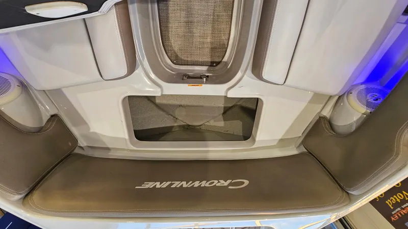 Slide: The Image of 2020 Crownline Eclipse E215 XS boat interior with branded seating and storage area. - 25