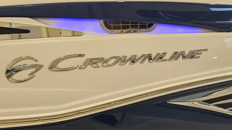 Slide: The Image of 2020 Crownline Eclipse E215 XS boat with illuminated logo detail. - 32