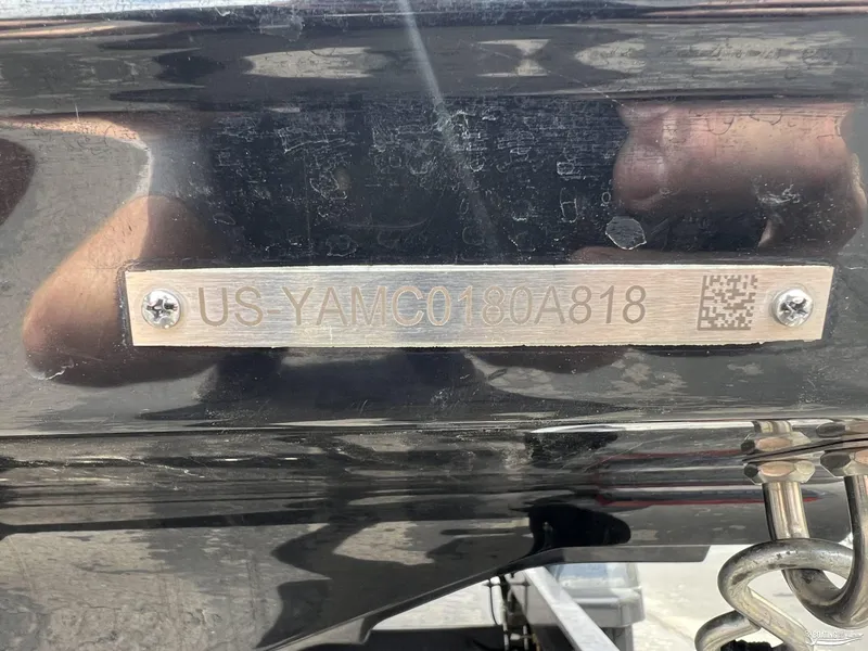 Slide: The Image of 2018 Yamaha Boats AR195 hull identification number plate with QR code. - 17