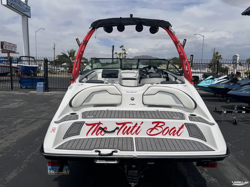 Slide: The Image of 2018 Yamaha AR195 boat with custom "Tia Tuti Boat" lettering, parked outdoors. - 3