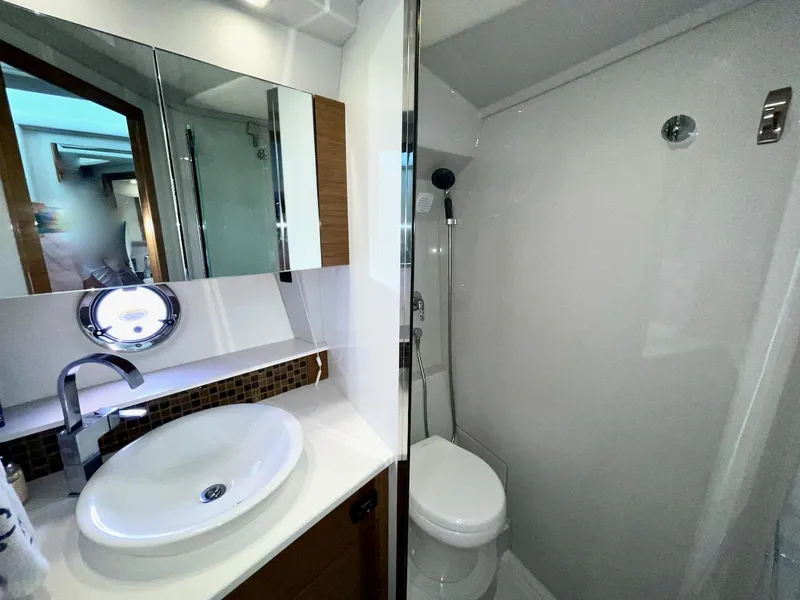 Slide: The Image of Luxurious bathroom in 2018 Cruisers 45 Cantius yacht with modern fixtures and shower. - 49
