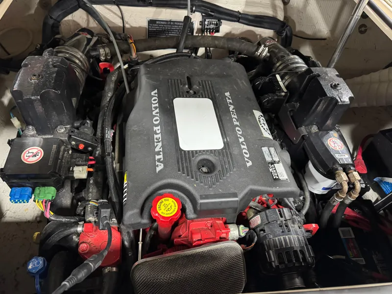 Slide: The Image of Volvo Penta engine in a 2005 Rinker 282 Captiva Bowrider boat. - 14